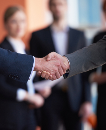 two men doing a handshake