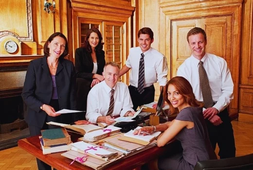 Group of happy lawyers in the office