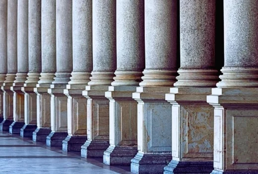 Row of classical columns, full frame horizontal composition, copy space