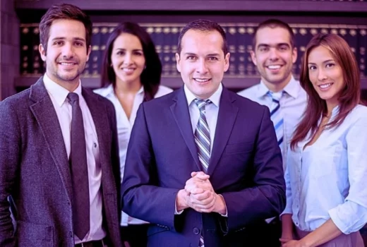 American business man leading a group at the office